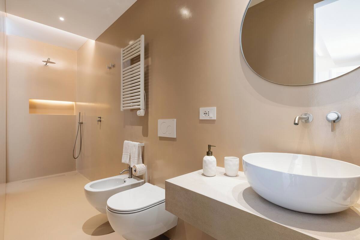 deluxe double or twin room | bathroom | designer toiletries, hair dryer, slippers, bidet
