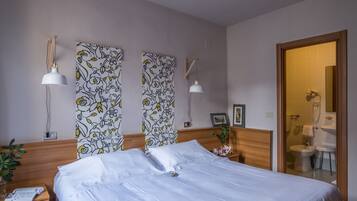 Hypo-allergenic bedding, minibar, in-room safe, desk