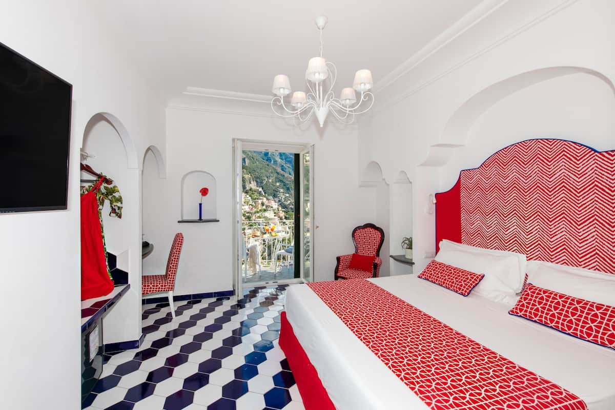 Chambre Double Deluxe, vue mer | Draps en coton égyptien, literie de qualité supérieure, minibar