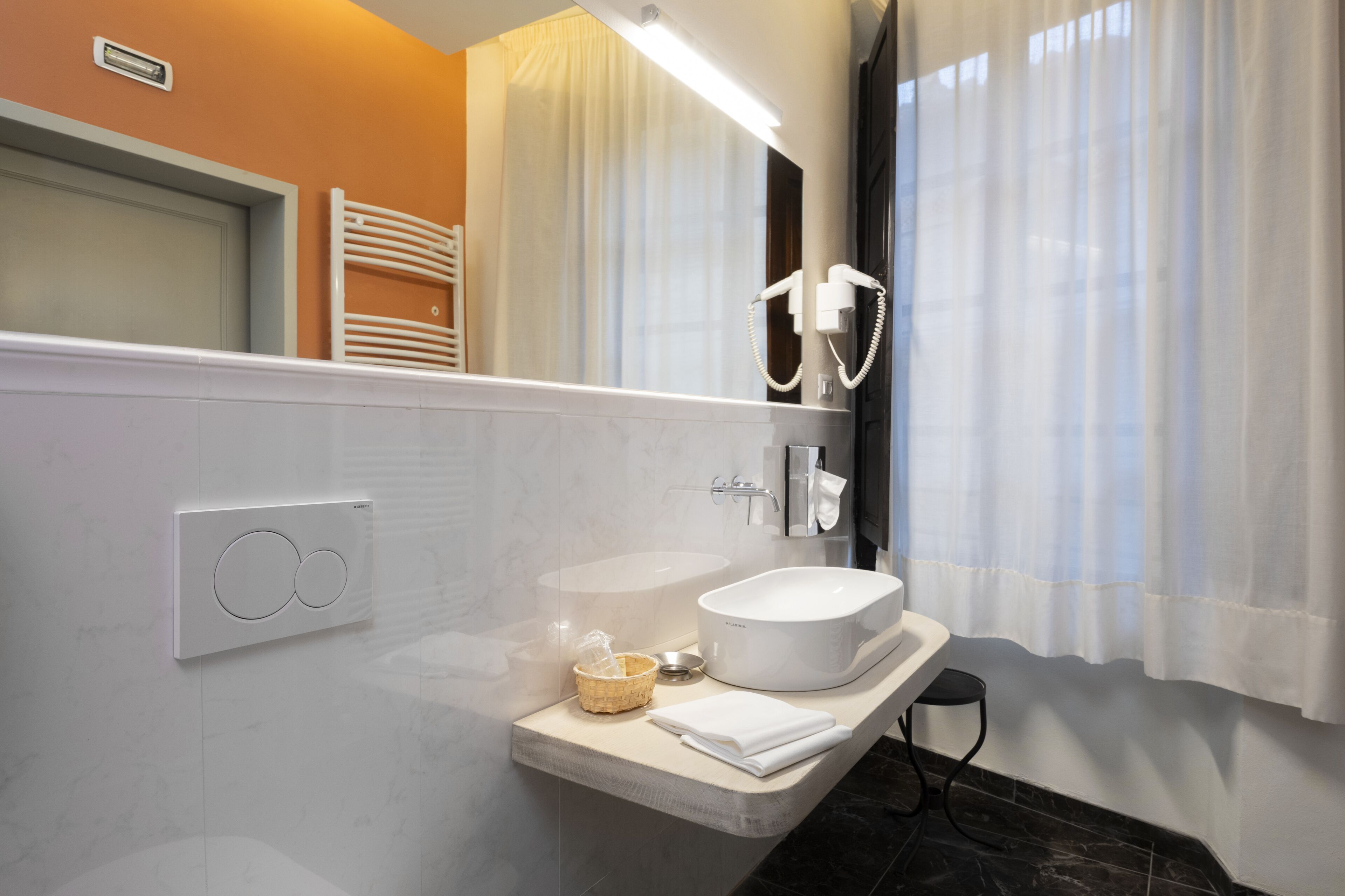 quadruple room | bathroom | rainfall showerhead, free toiletries, hair dryer, bidet