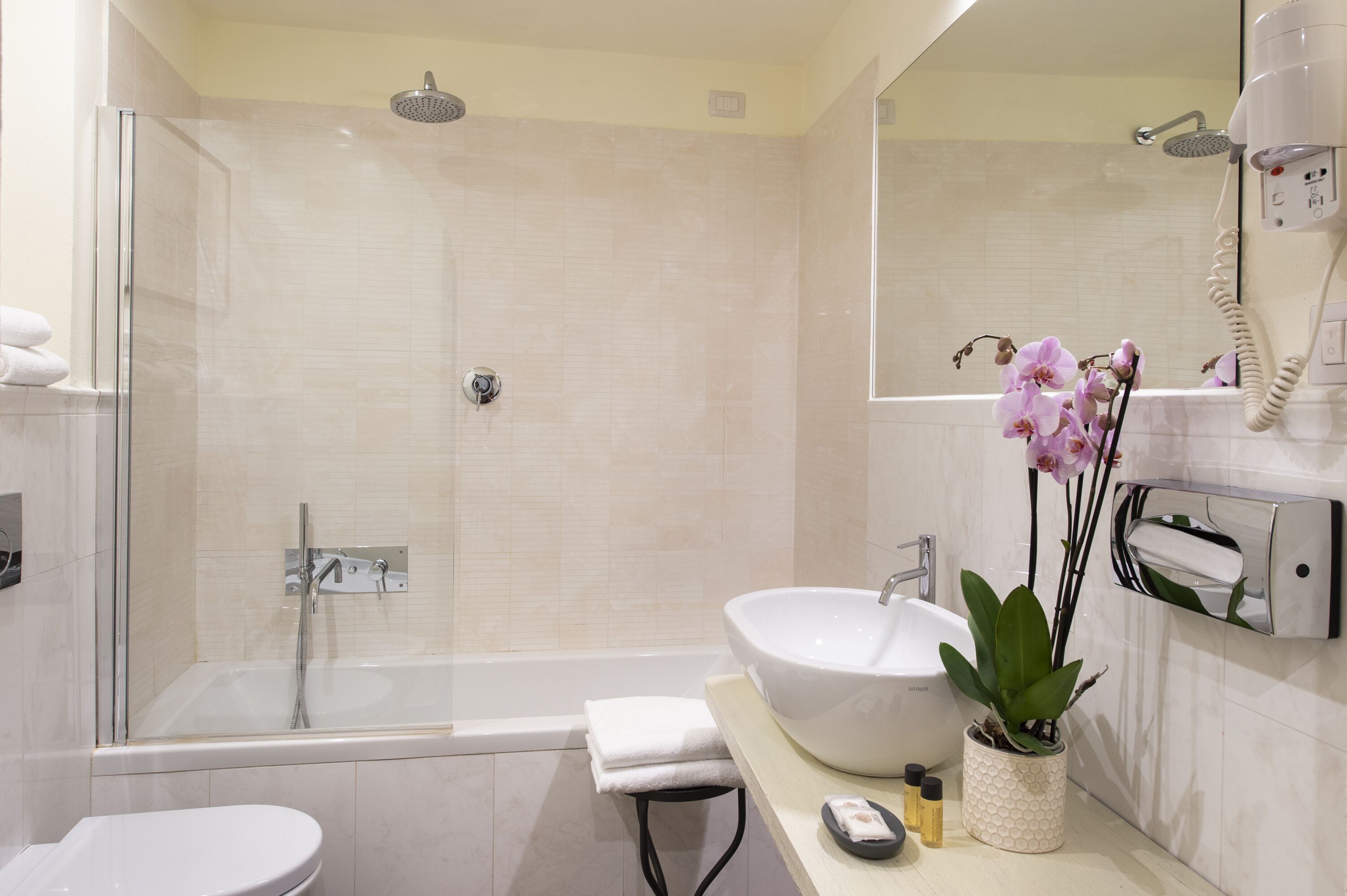 quadruple room | bathroom | rainfall showerhead, free toiletries, hair dryer, bidet