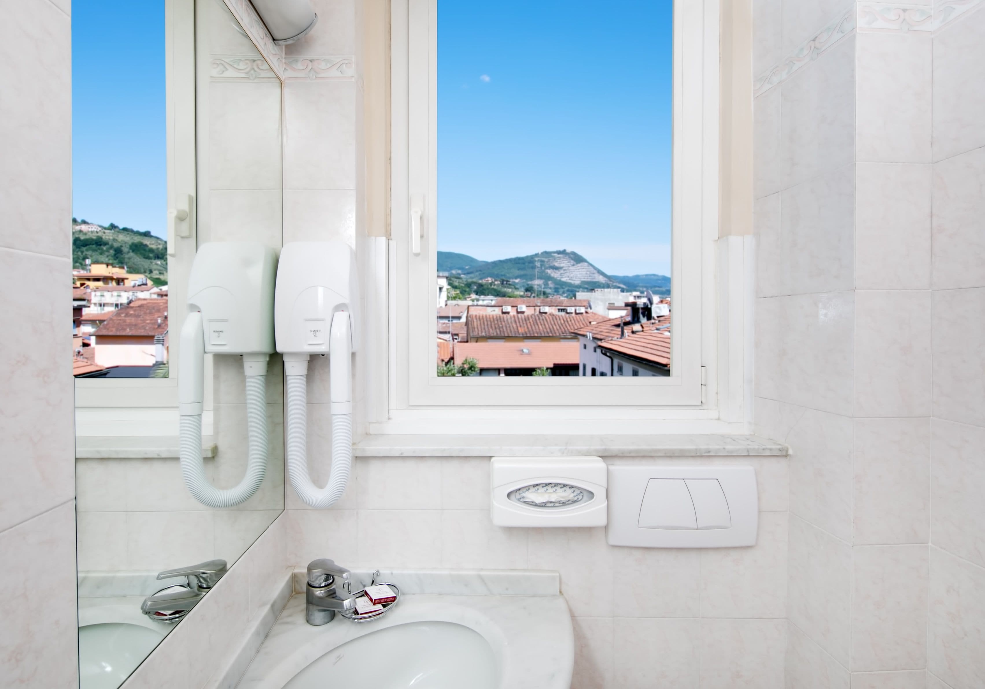 free toiletries, hair dryer, bidet, towels