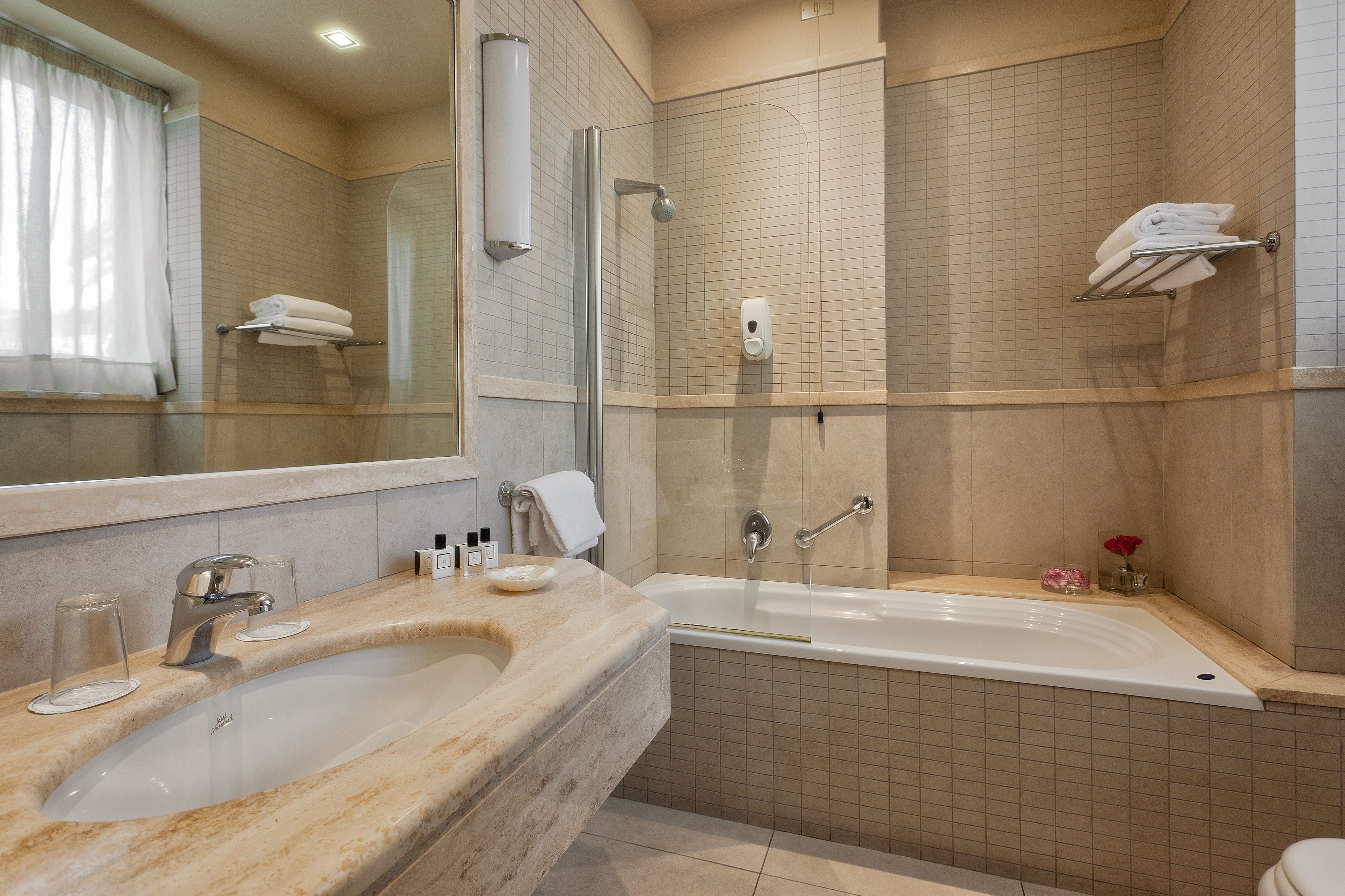 free toiletries, hair dryer, bidet, towels