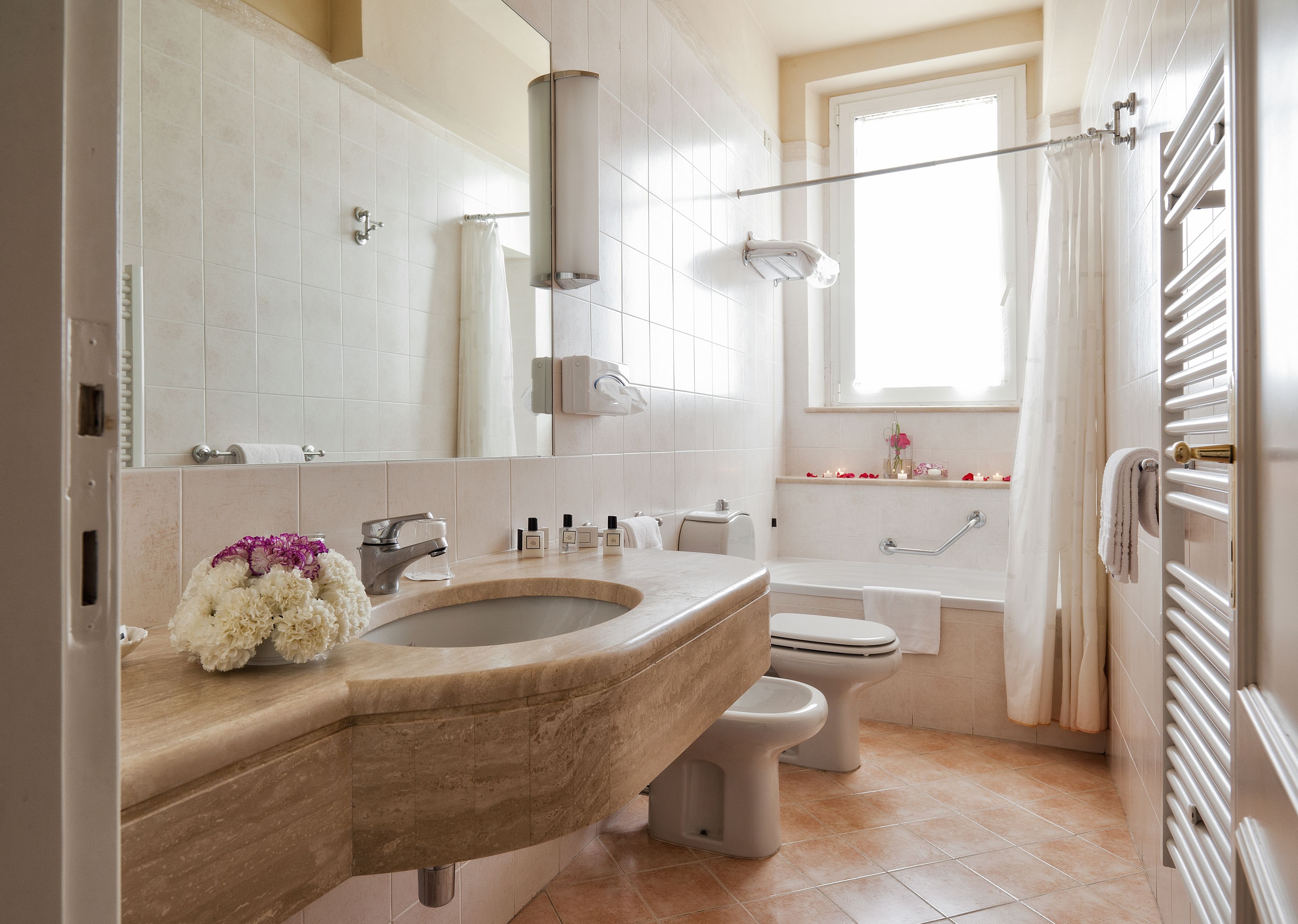 free toiletries, hair dryer, bidet, towels