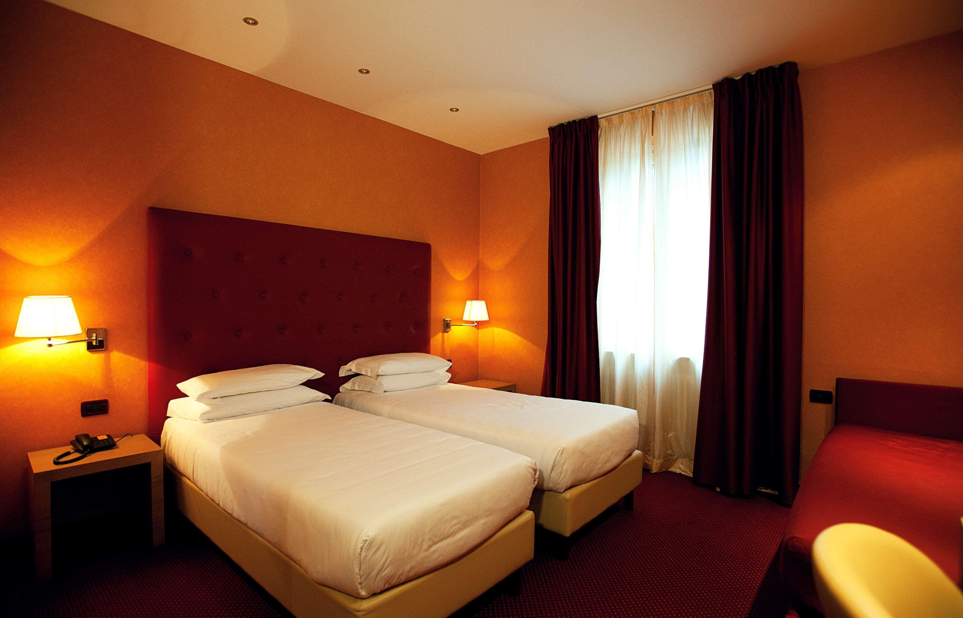 Hypo-allergenic bedding, down duvets, minibar, in-room safe