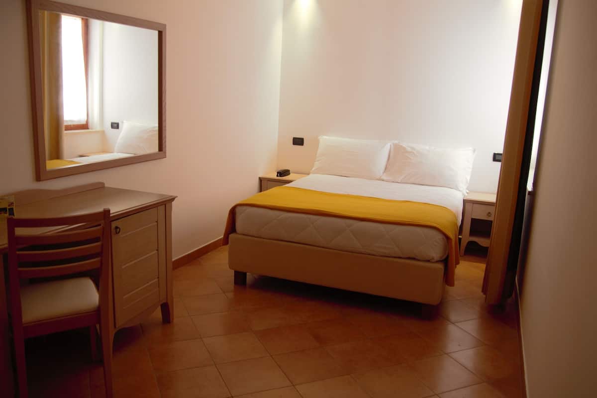 Double Room (Non Panoramic) | Minibar, in-room safe, iron/ironing board, cribs/infant beds