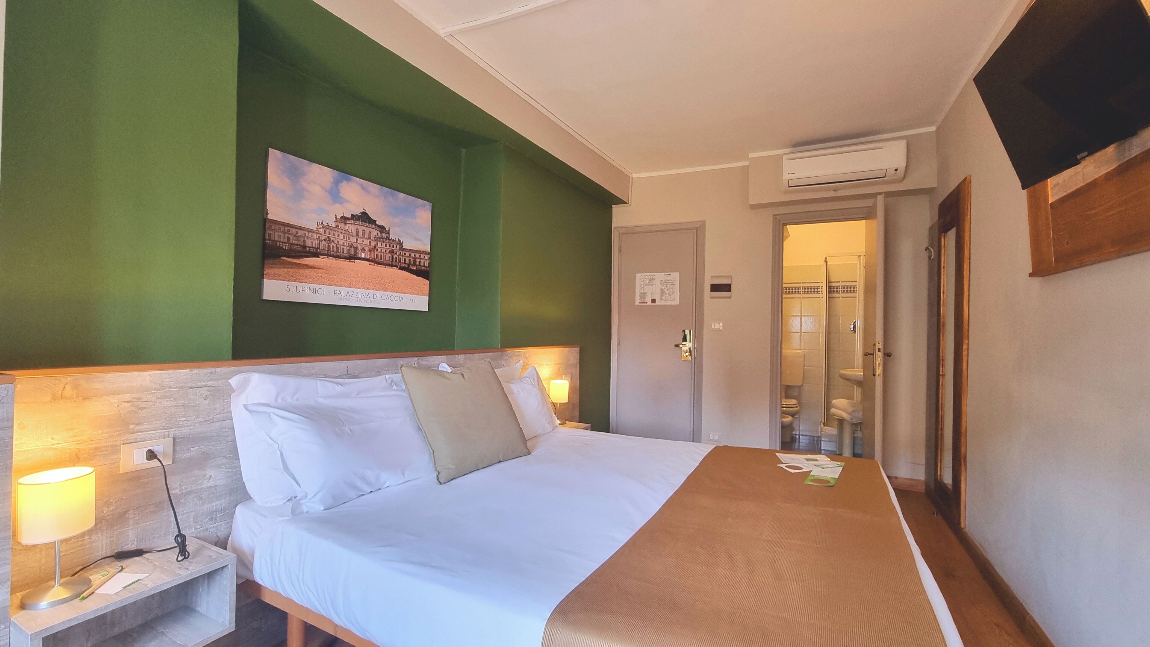 Double Room | Desk, blackout drapes, iron/ironing board, free WiFi