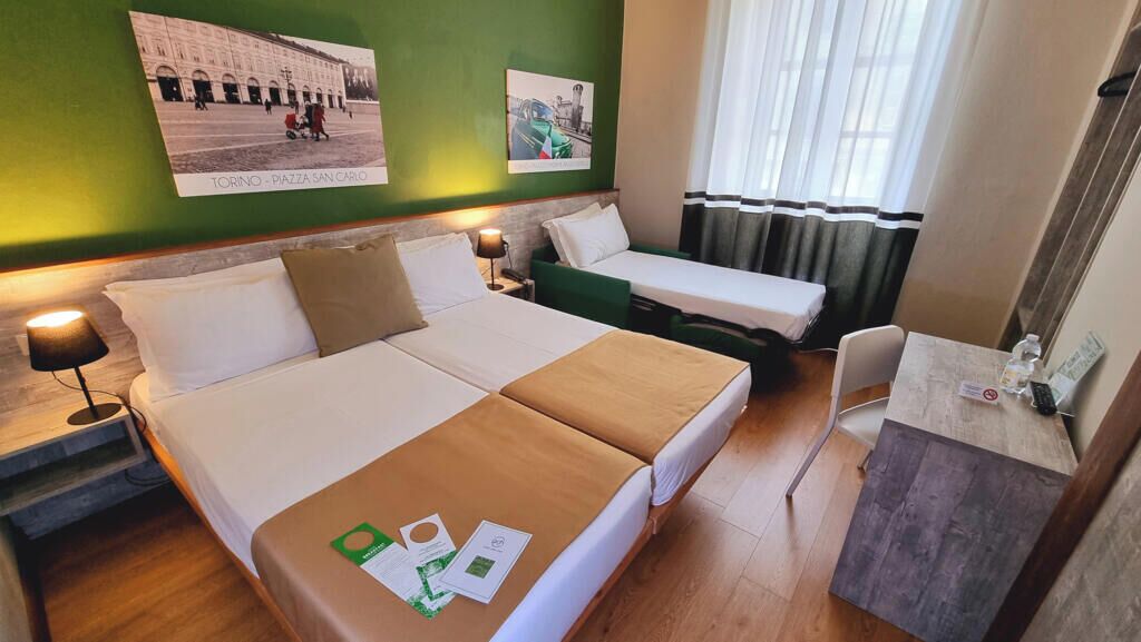 Triple Room | Desk, blackout drapes, iron/ironing board, free WiFi