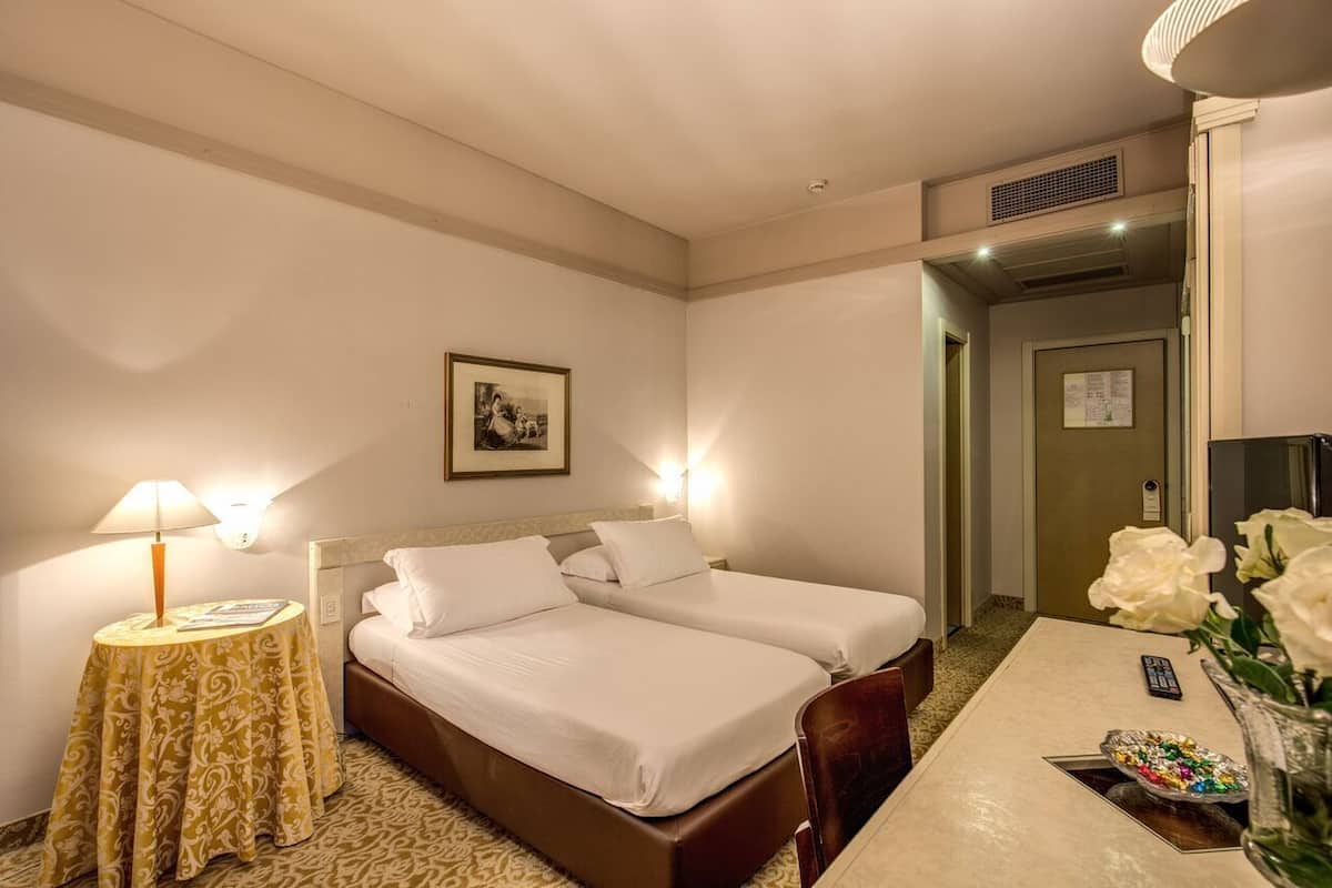 Twin Room | Minibar, in-room safe, desk, free WiFi