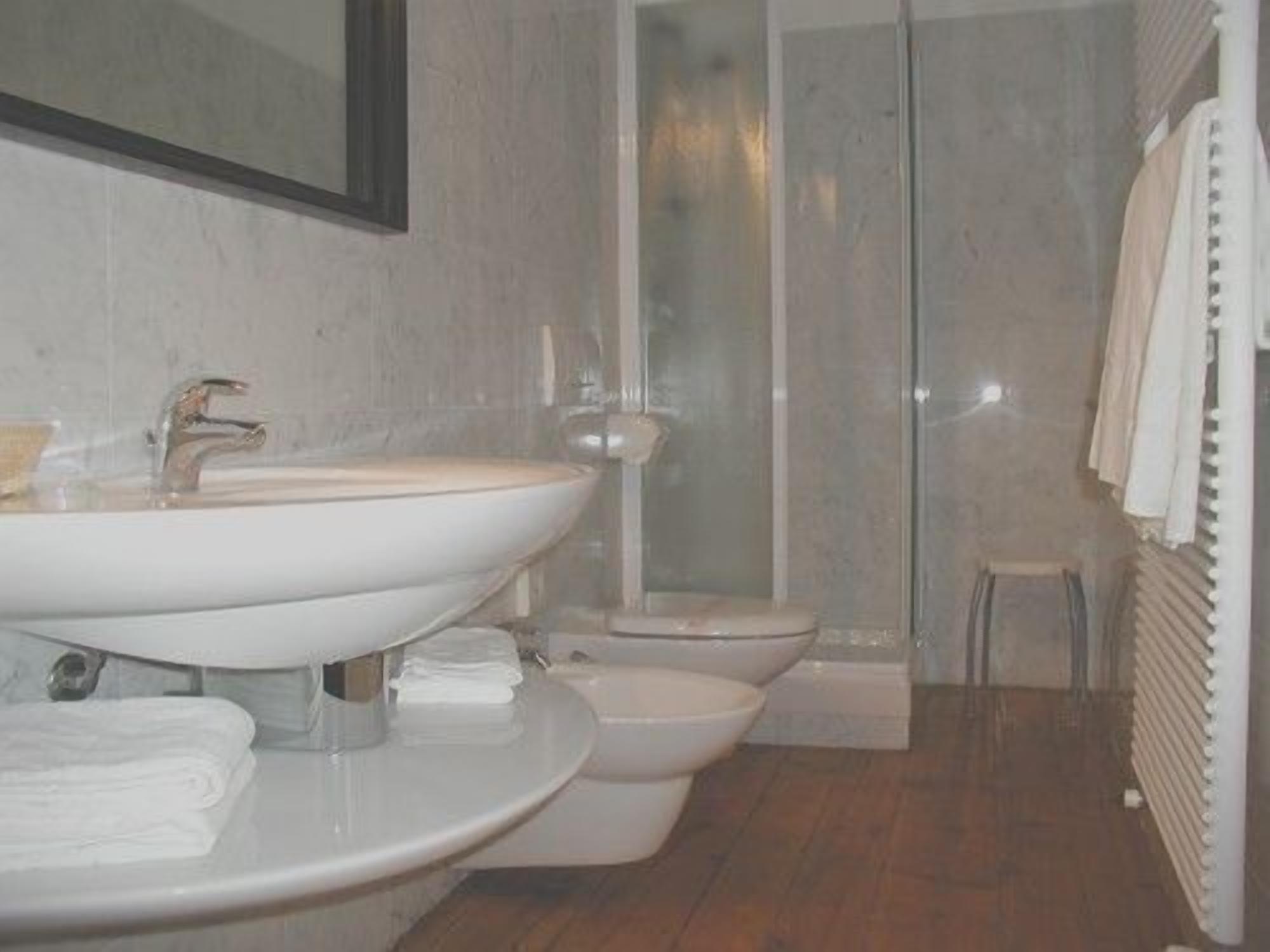 free toiletries, hair dryer, bidet, towels