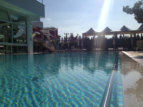 Indoor pool, 2 outdoor pools, open 8:00 AM to 7:30 PM, pool umbrellas