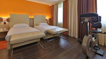 Deluxe Room, 2 Twin Beds, Non Smoking | Minibar, in-room safe, soundproofing, iron/ironing board