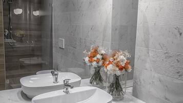 Shower, free toiletries, hair dryer, bathrobes