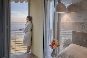 Deluxe Suite, Sea View | Minibar, in-room safe, iron/ironing board, free WiFi