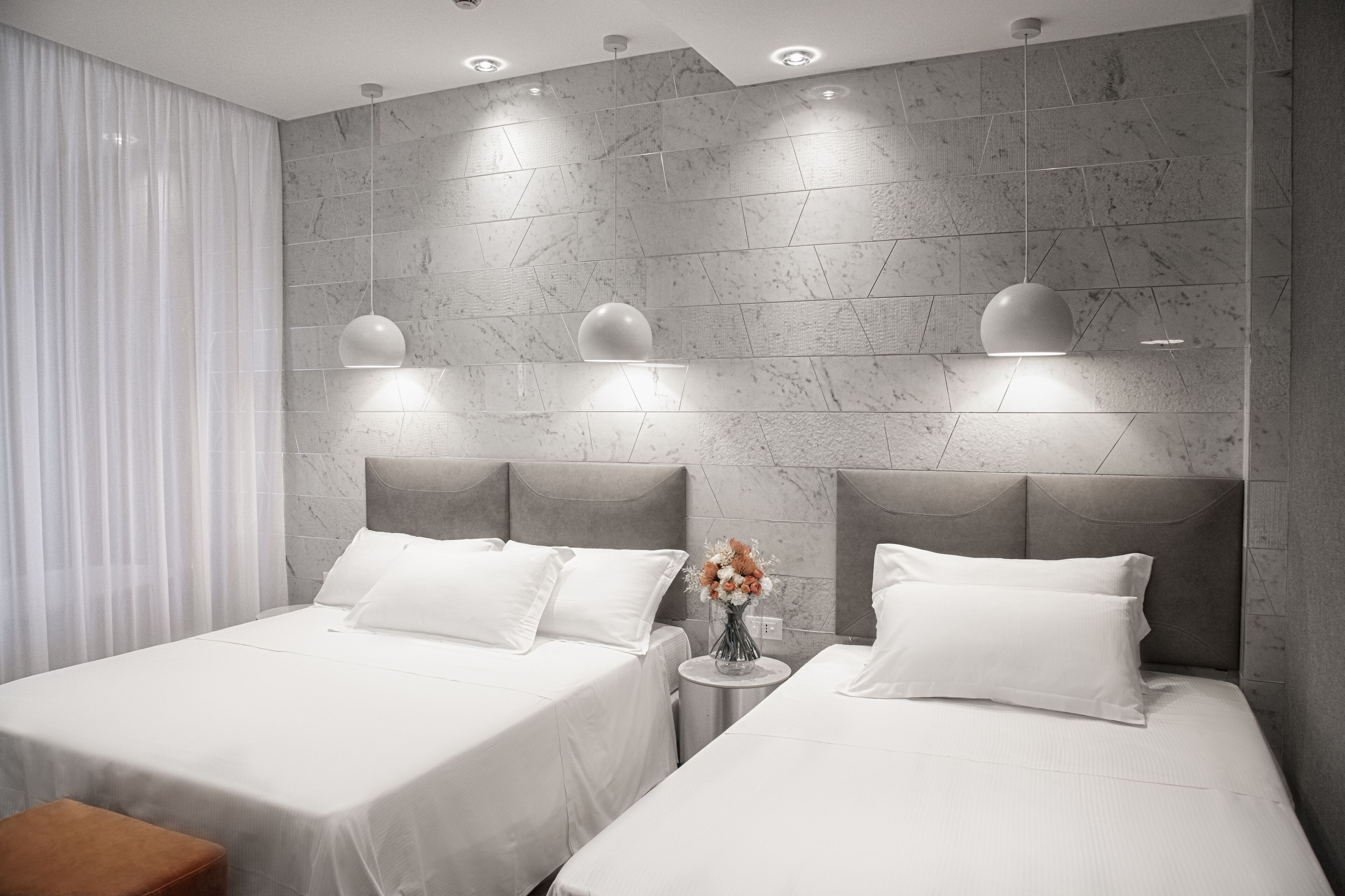 deluxe quadruple room | minibar, in-room safe, iron/ironing board, free wifi