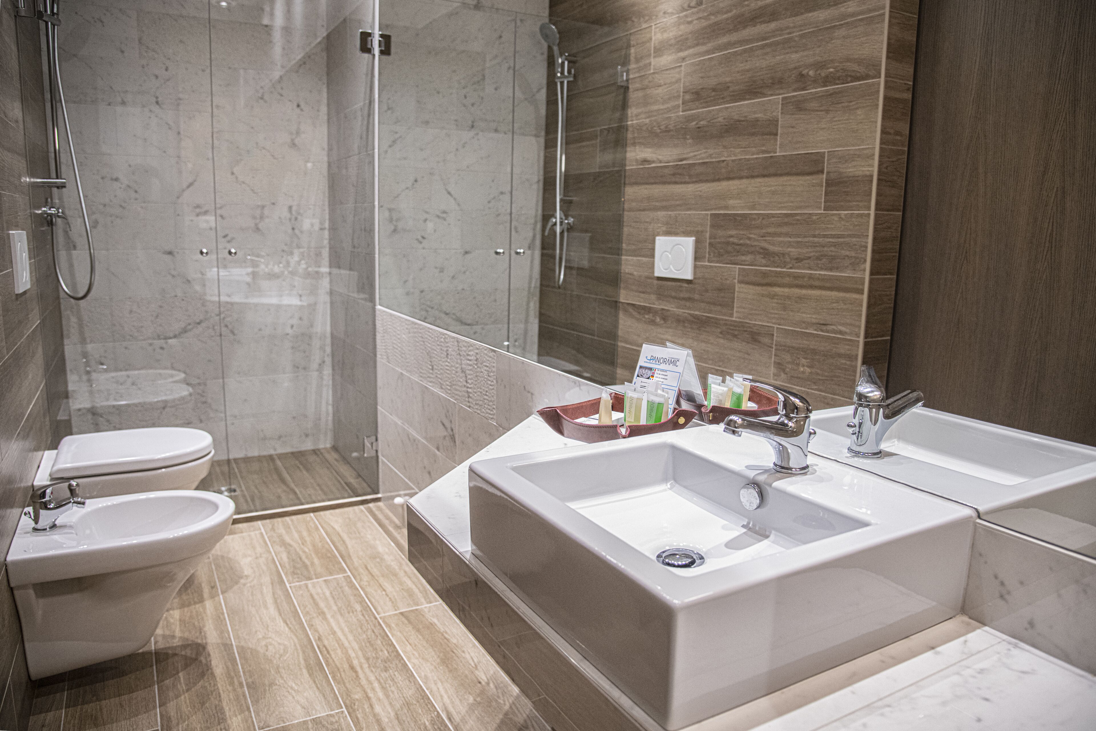 deluxe suite | bathroom | shower, free toiletries, hair dryer, bathrobes