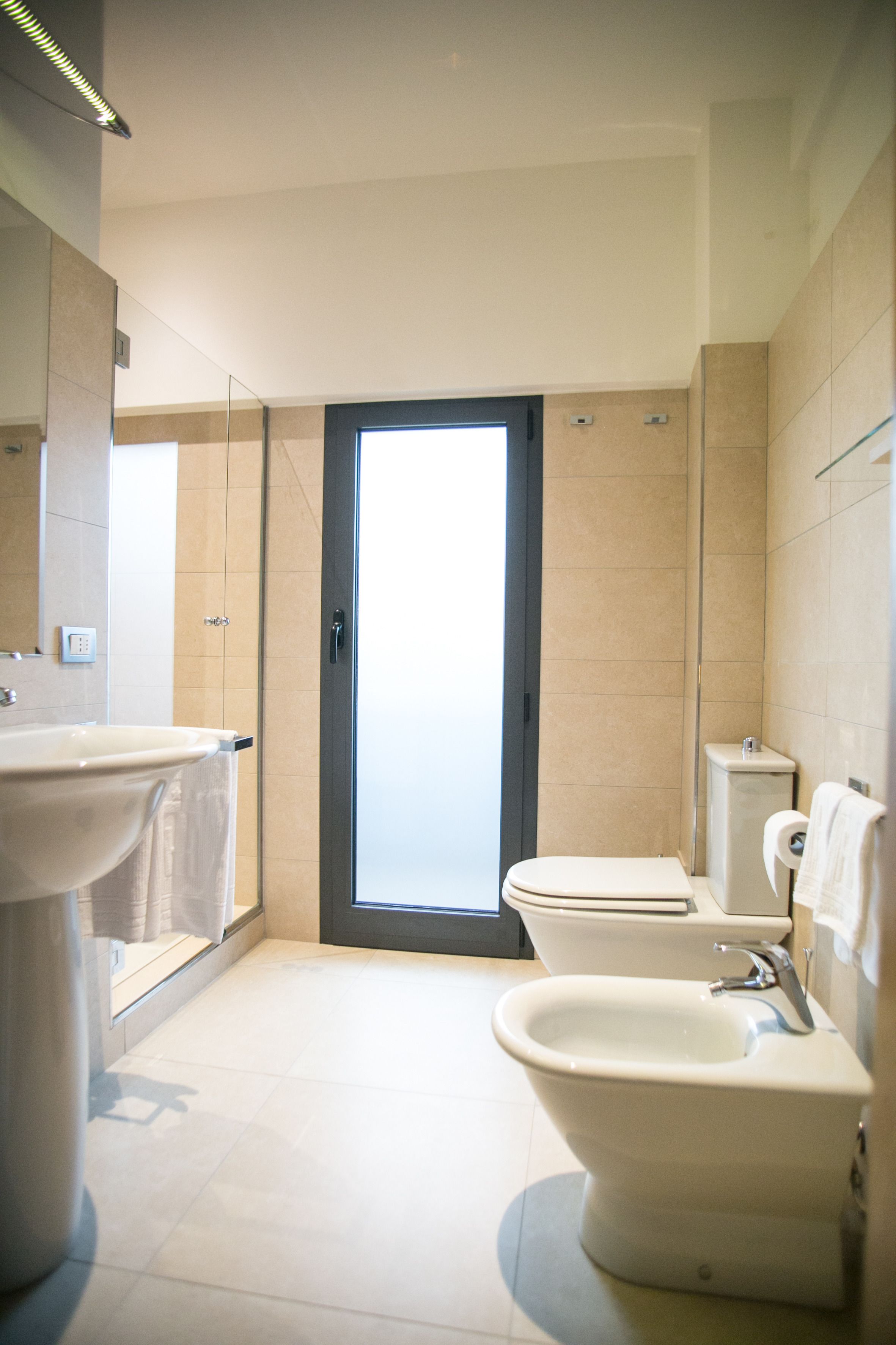 combined shower/bathtub, free toiletries, hair dryer, bathrobes