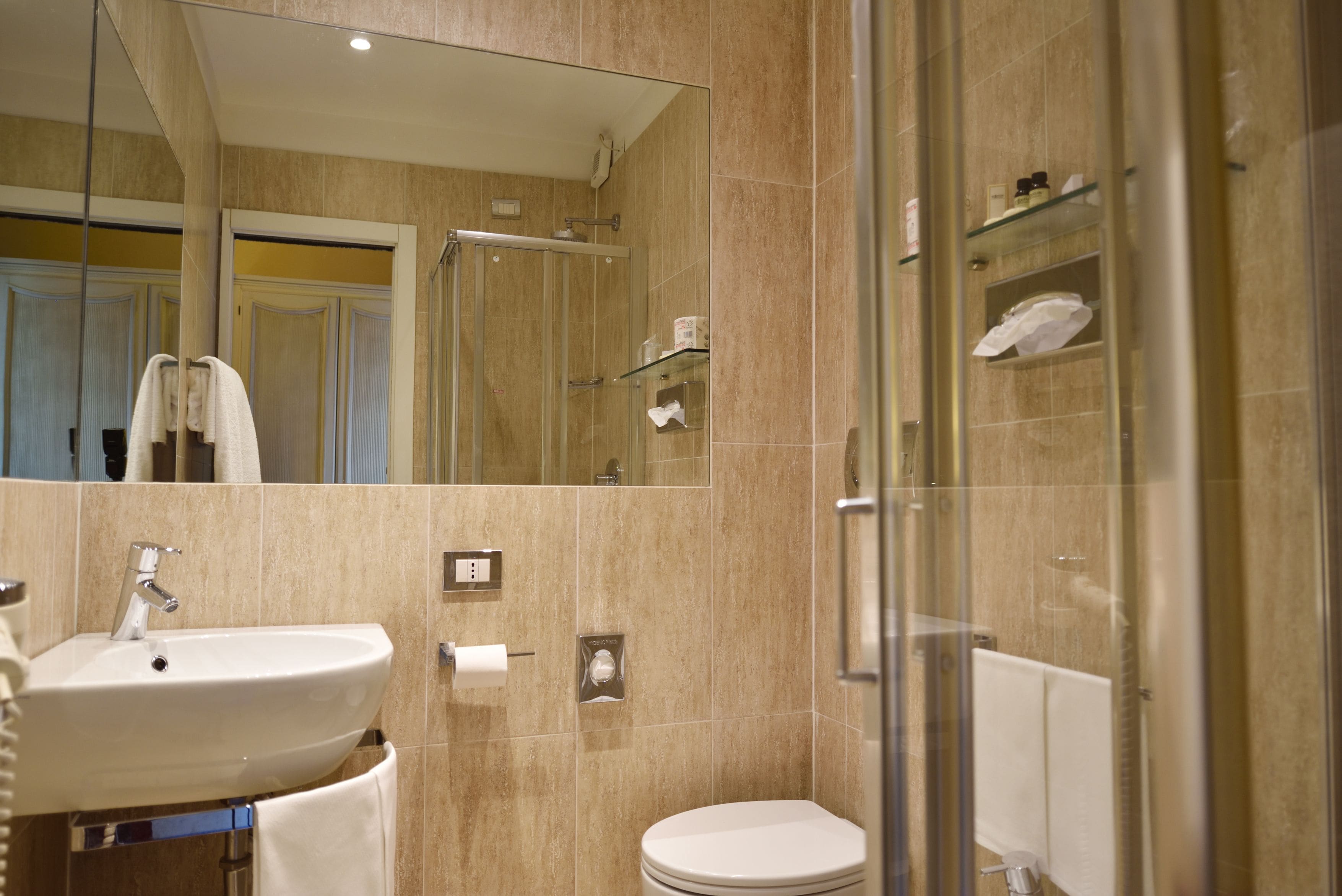 free toiletries, hair dryer, bidet, towels