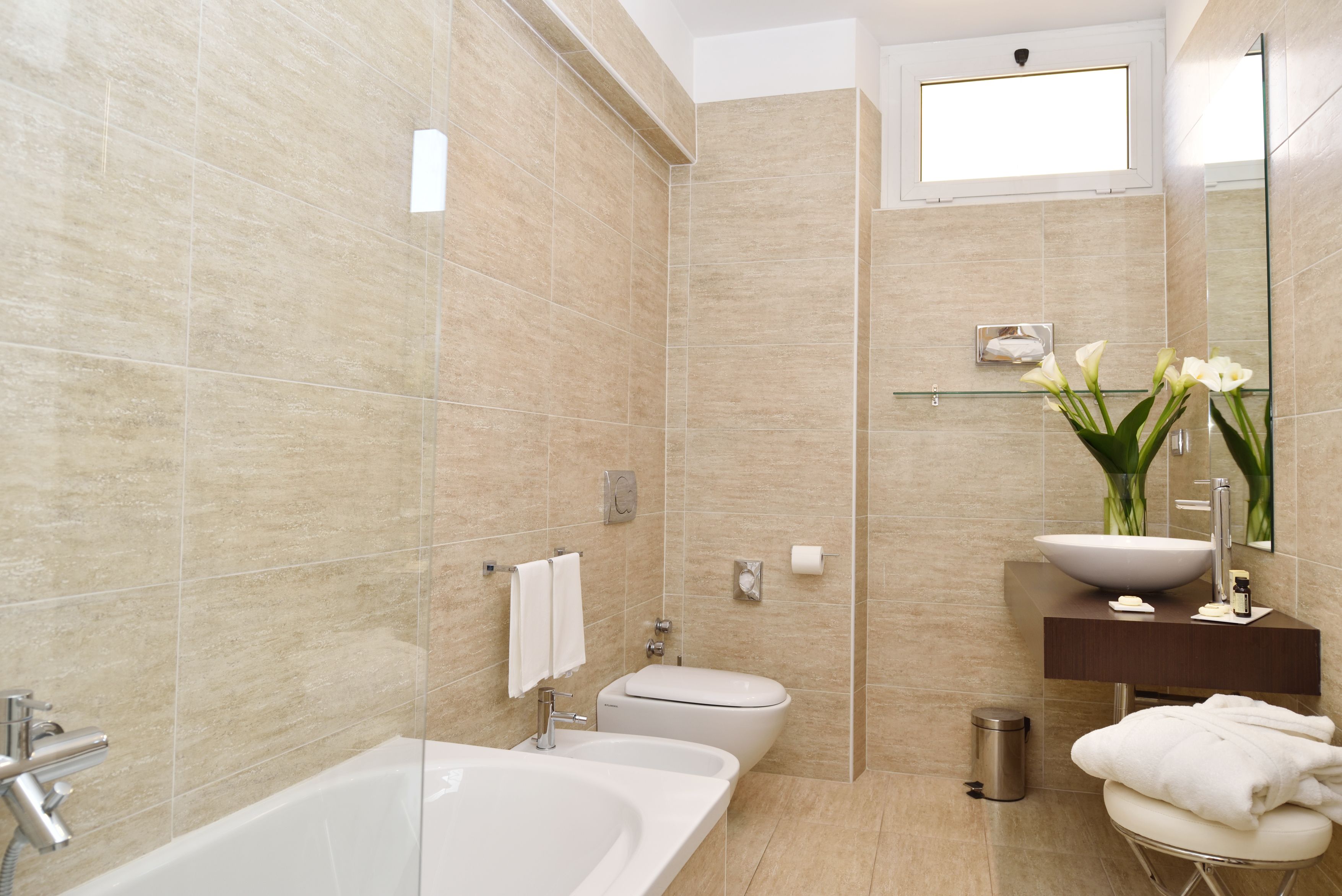 free toiletries, hair dryer, bidet, towels