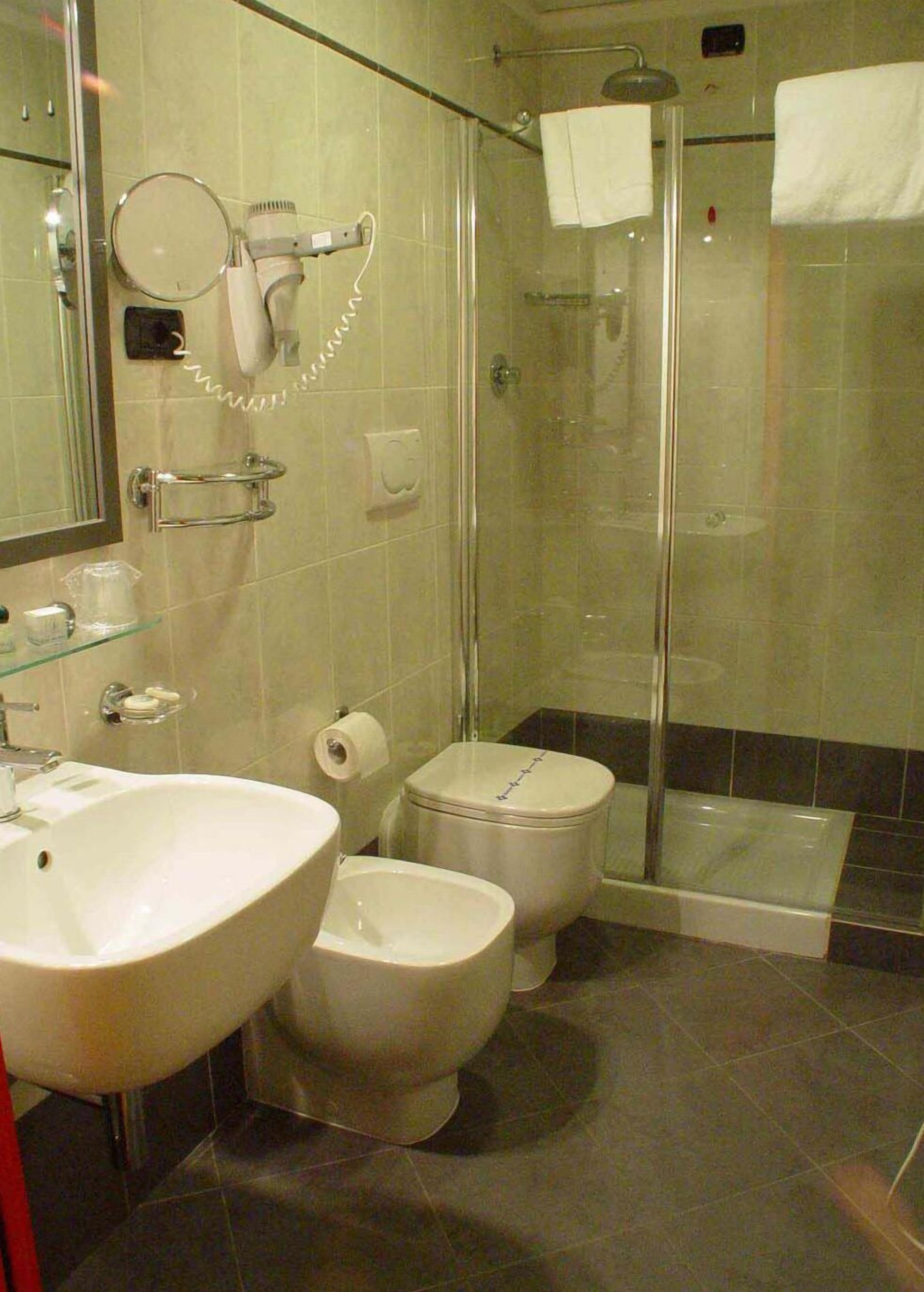 shower, free toiletries, hair dryer, slippers