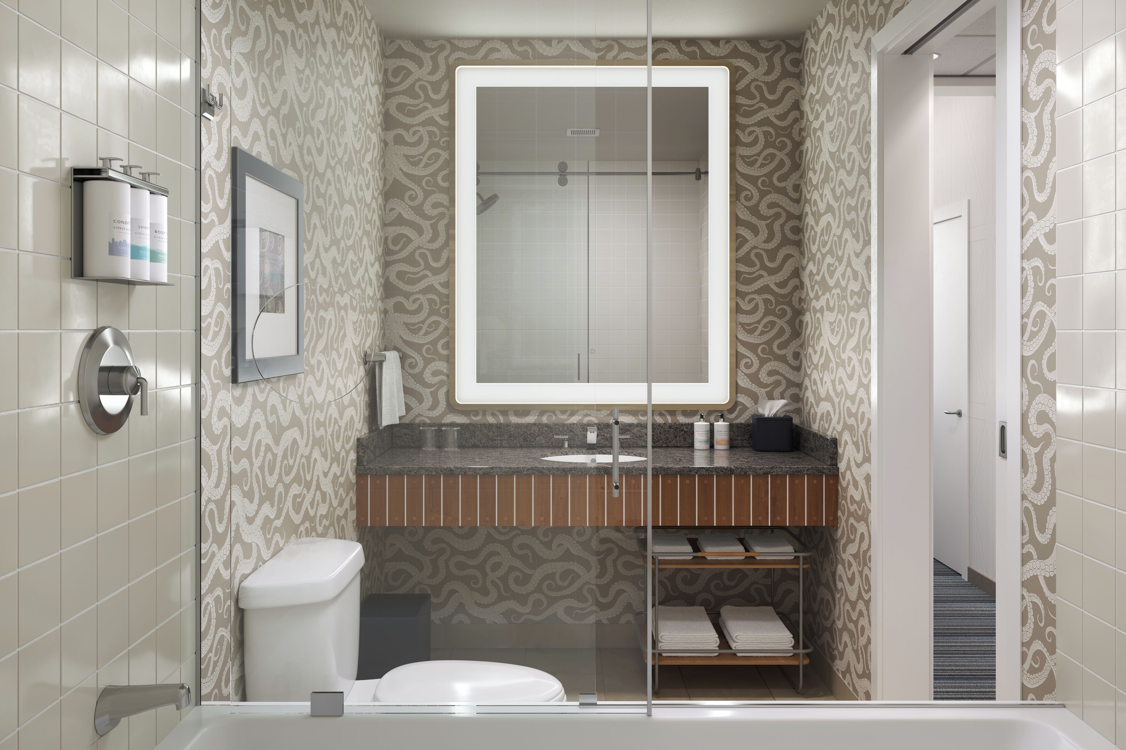 A modern bathroom with a shower, toilet, and sink.