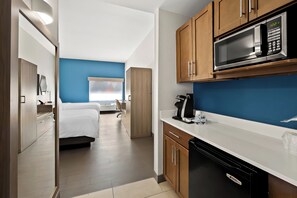 Coffres-forts dans les chambres, bureau, fer et planche à repasser