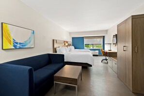 Caixa forta a l'habitació, escriptori i planxa i posts de planxar 