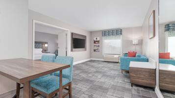 Suite, 1 King Bed, Non Smoking | Desk, laptop workspace, blackout drapes, iron/ironing board