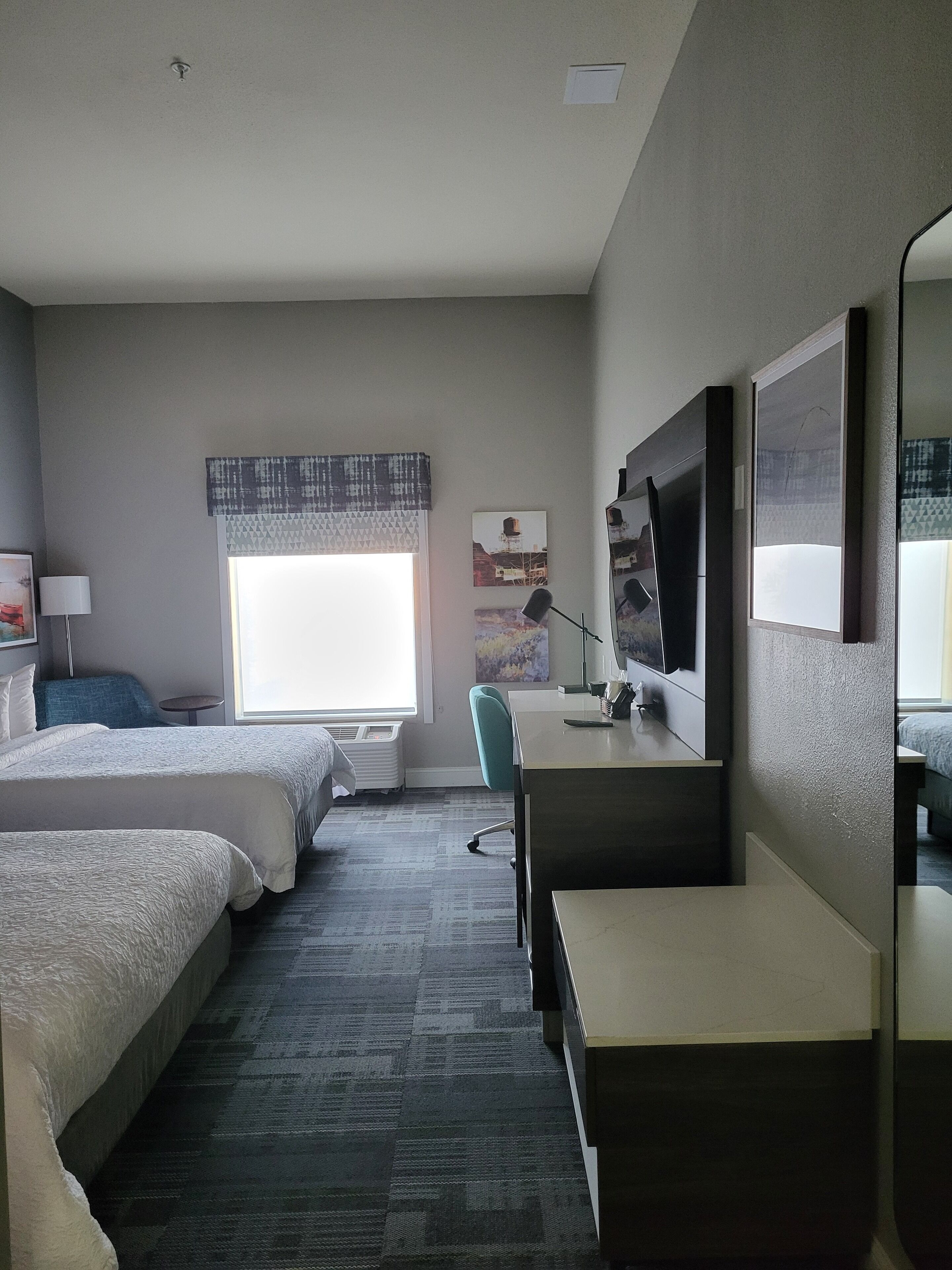 desk, laptop workspace, blackout curtains, iron/ironing board