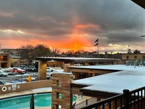 Enjoy a refreshing swim in the pool surrounded by a scenic view.