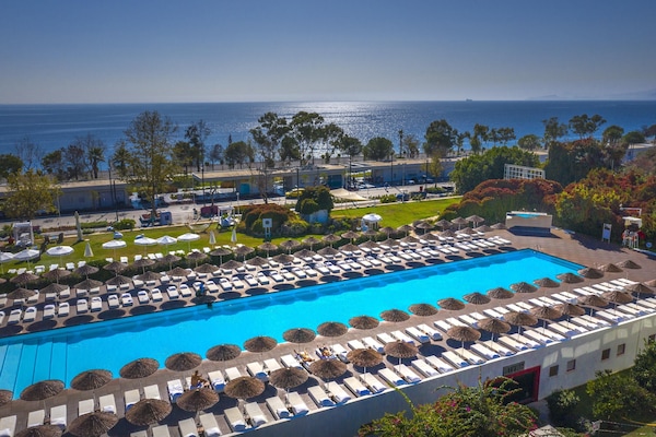 Indoor pool, seasonal outdoor pool, pool umbrellas, sun loungers