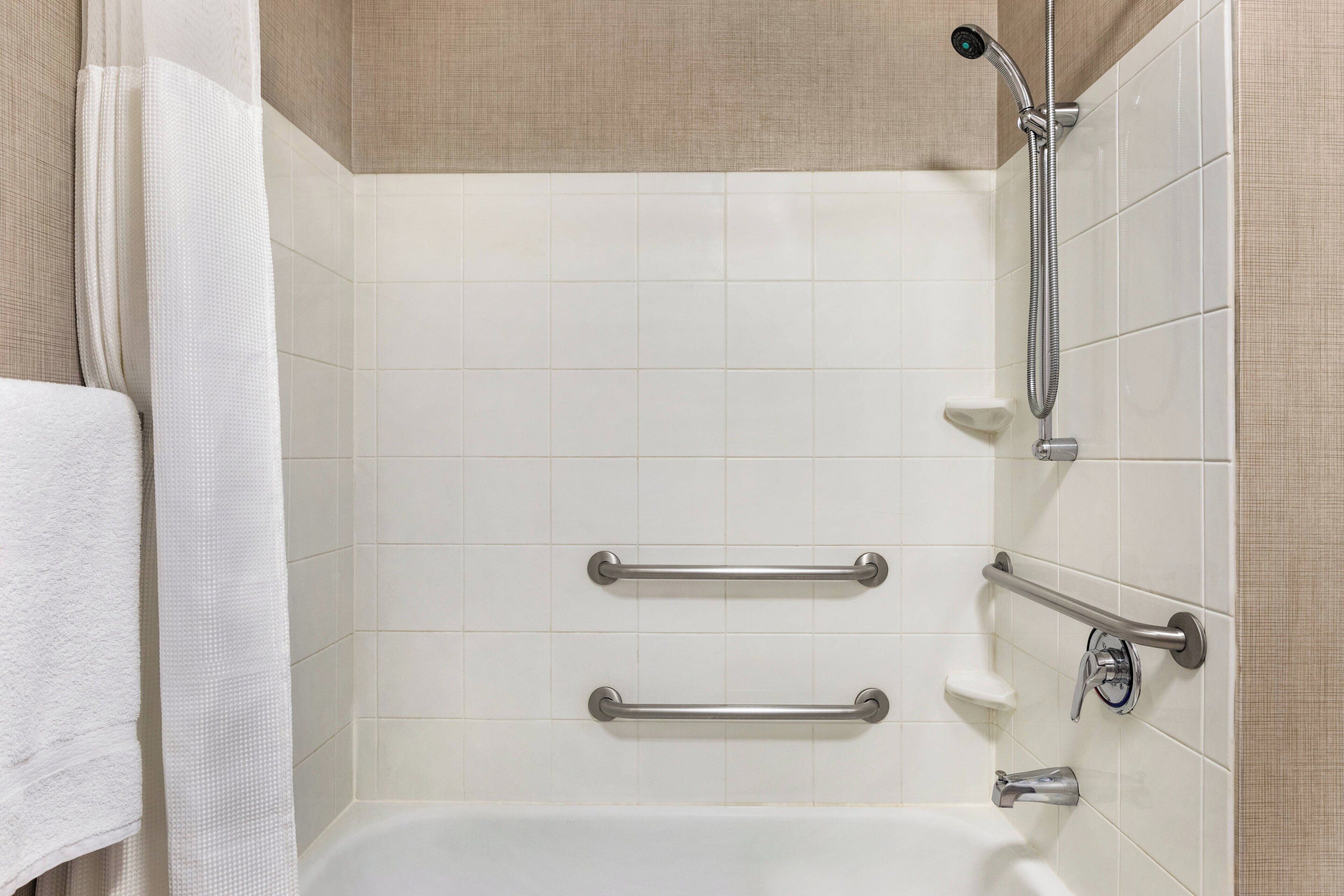 combined shower/bathtub, free toiletries, hair dryer, towels