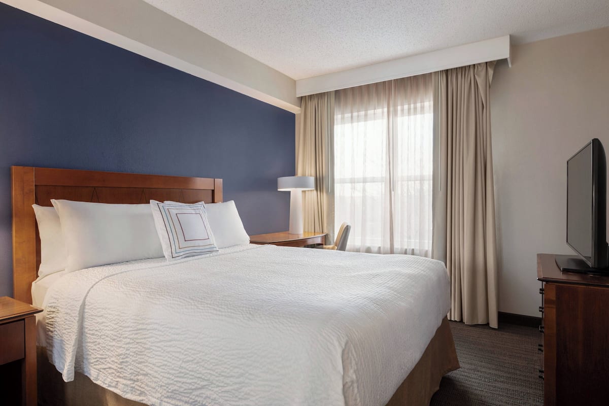 premium bedding, desk, blackout curtains, iron/ironing board