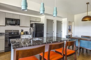 Mini-fridge, microwave, coffee/tea maker, cookware/dishes/utensils