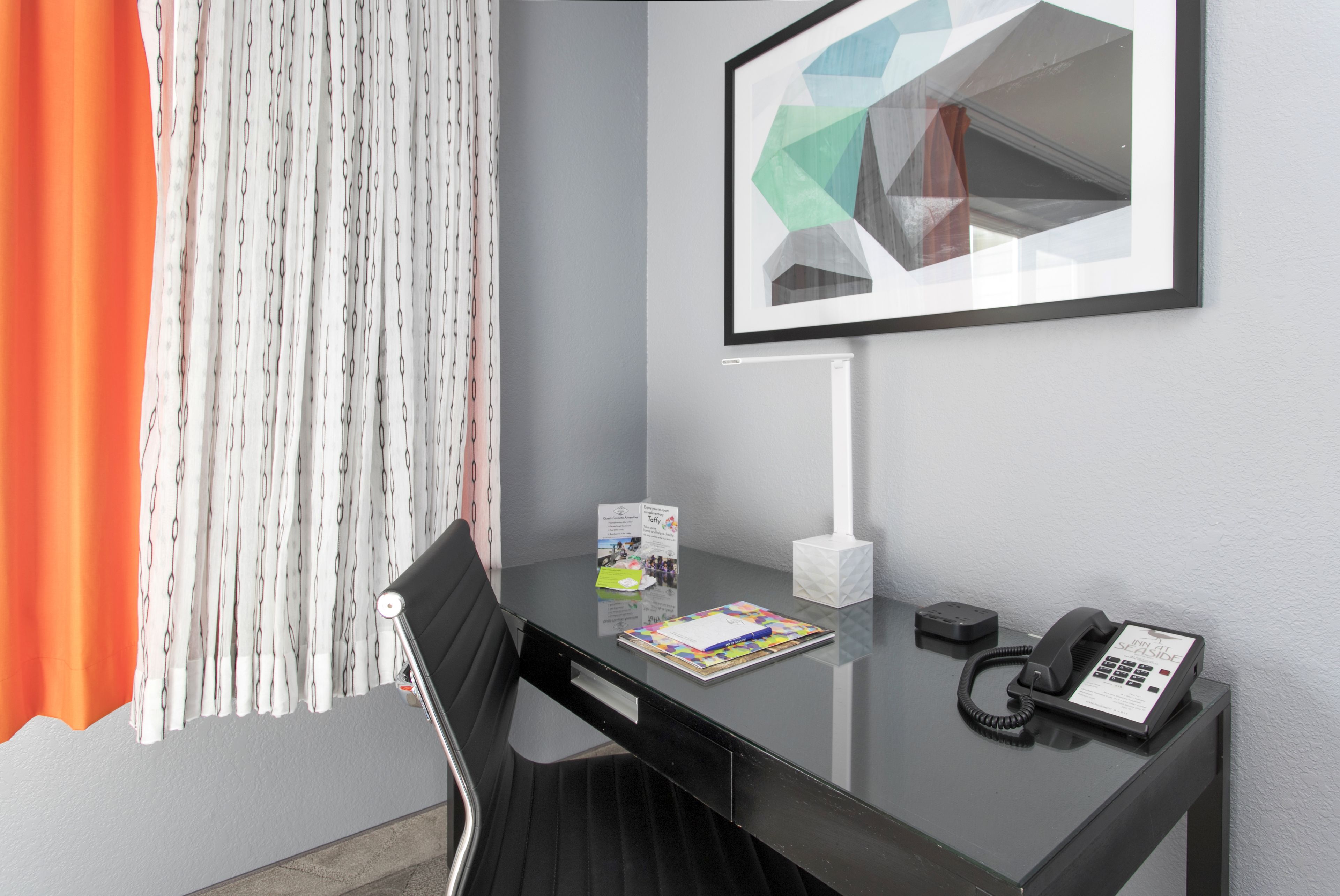 premium bedding, desk, blackout curtains, iron/ironing board