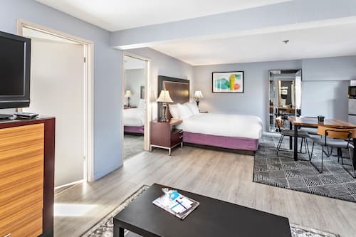 Suite, 2 Bedrooms | Premium bedding, desk, blackout drapes, iron/ironing board