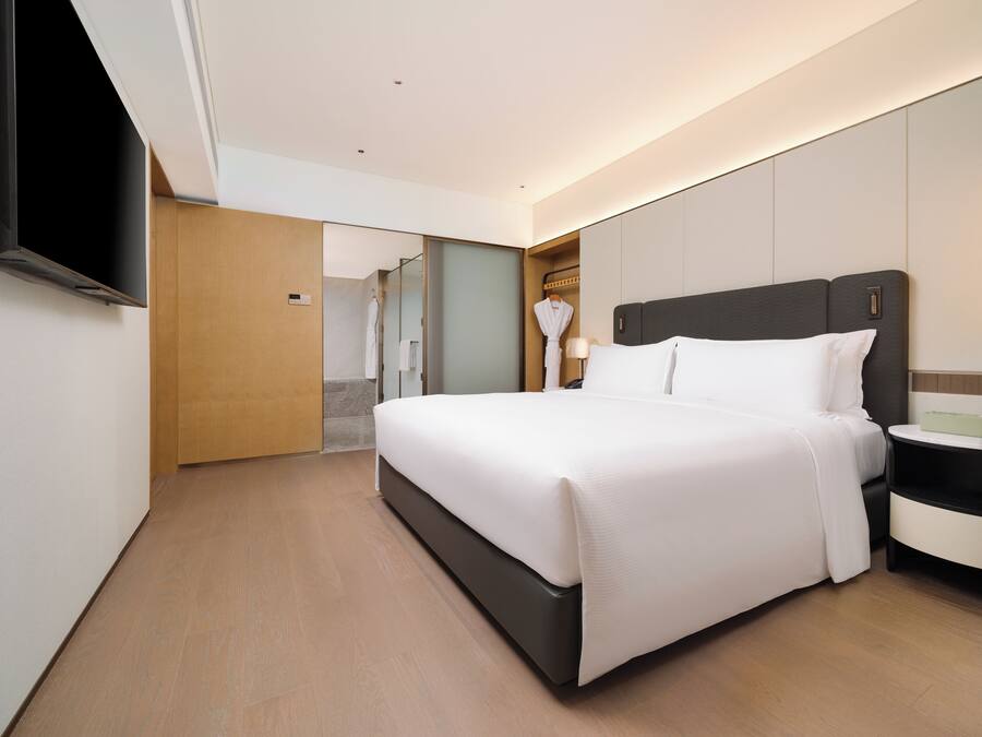 Ropa de cama de alta calidad, cubrecamas y minibar