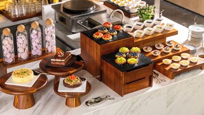 A buffet with various desserts and food items. - Canton Hotel Guangzhou, Tapestry Collection by Hilton (Guangzhou)