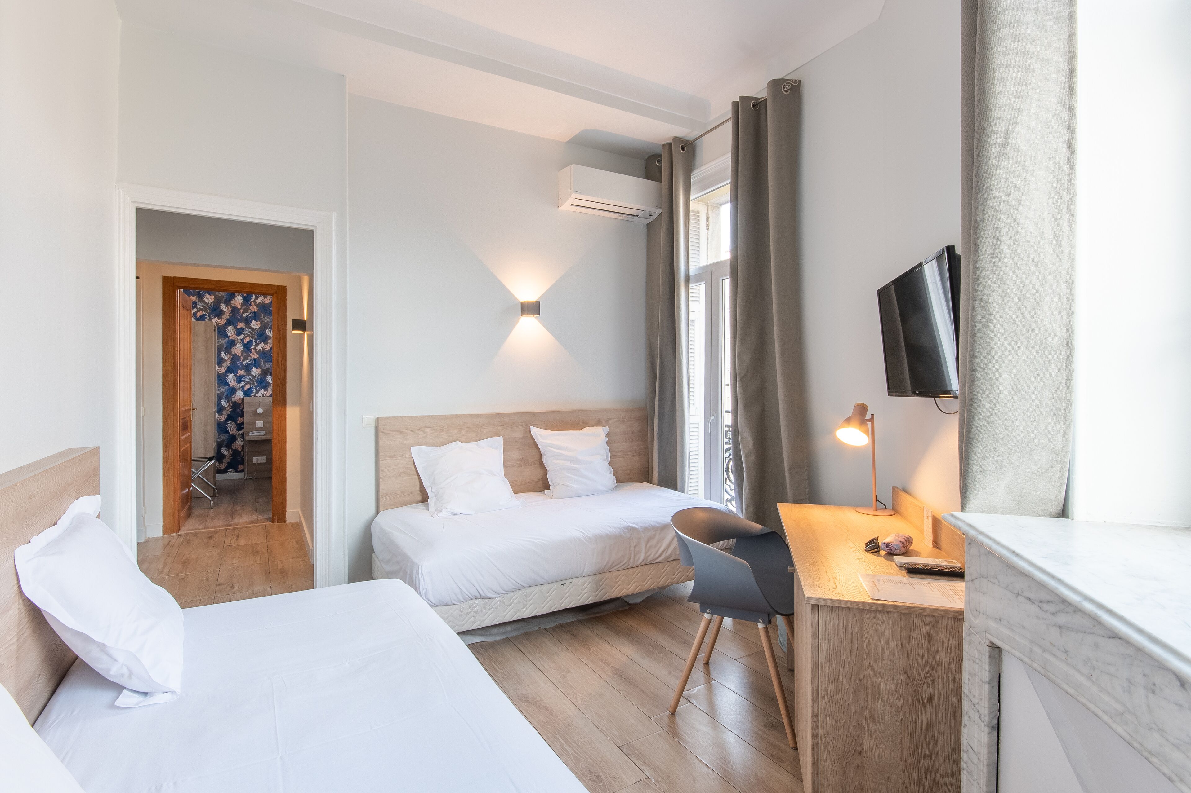 family room | 1 bedroom, minibar, in-room safe, blackout curtains