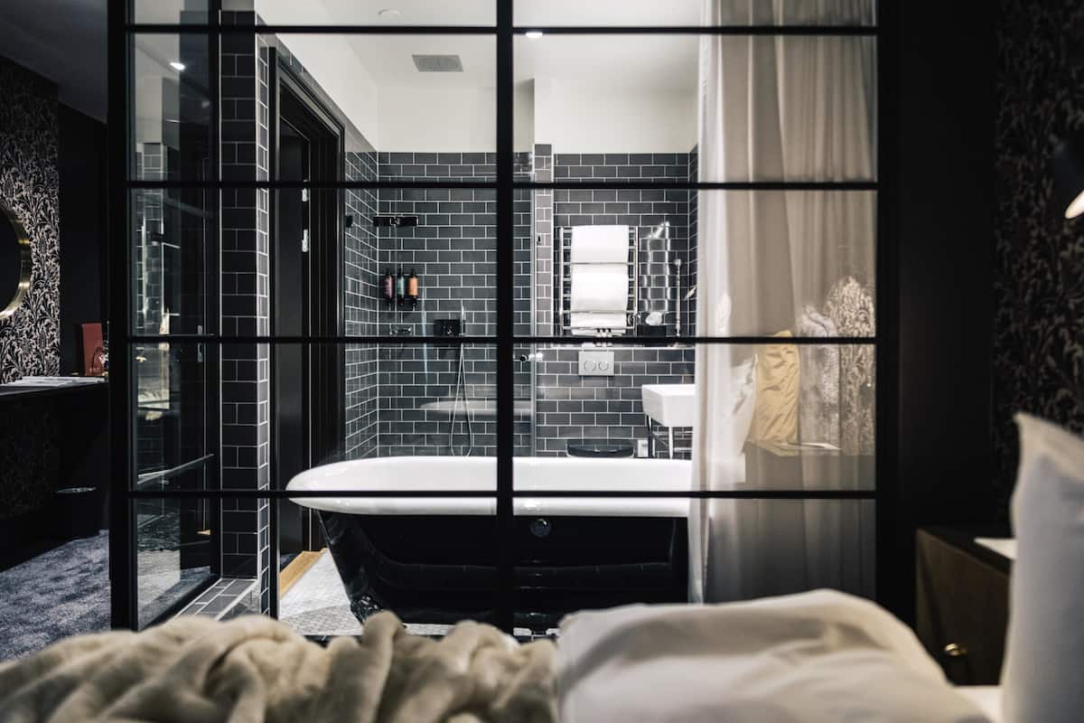 junior suite, 1 king bed, non smoking | bathroom | hair dryer, towels