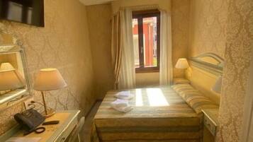 Economy Double Room | In-room safe, desk, free WiFi, bed sheets