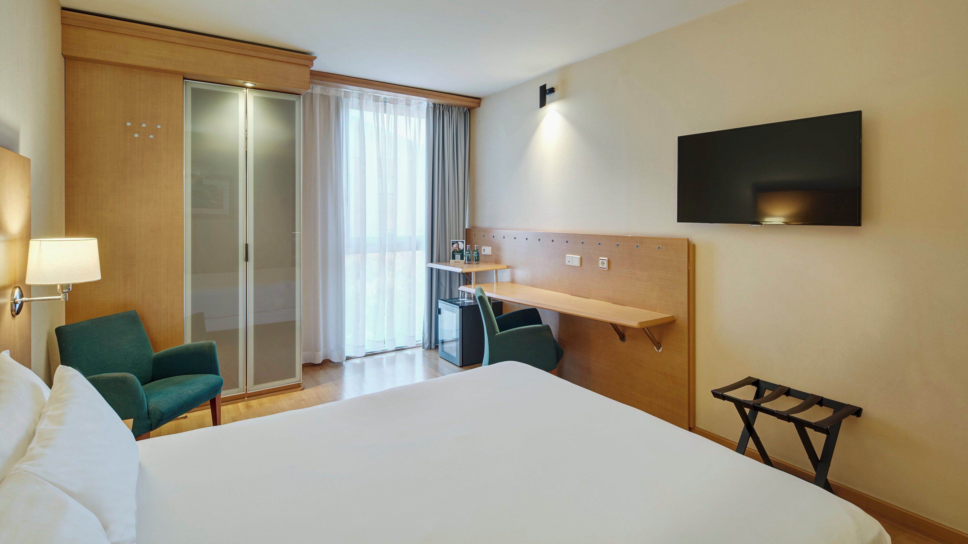 classic double room | minibar, in-room safe, desk, blackout curtains