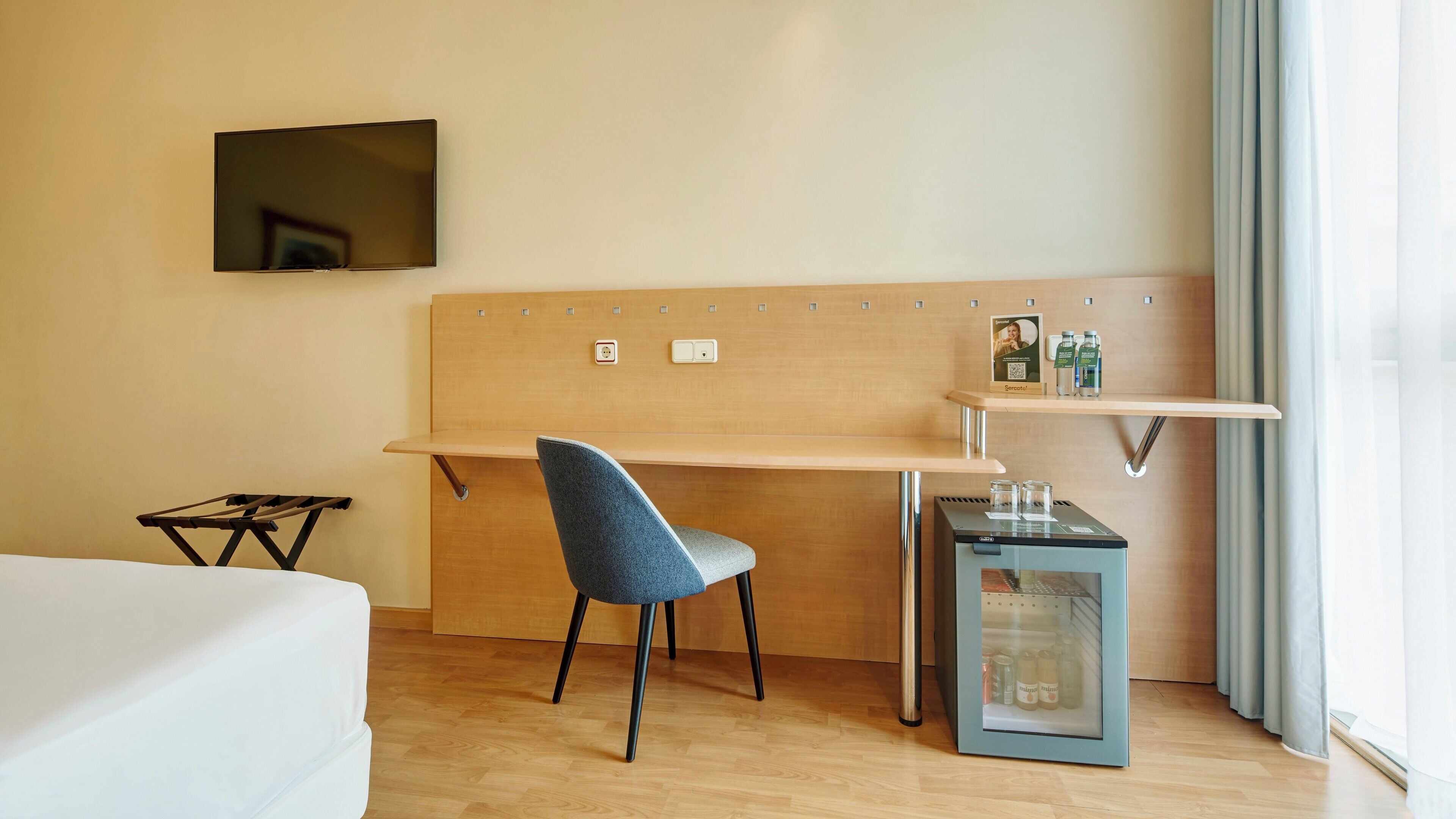 classic twin room | minibar, in-room safe, desk, blackout curtains