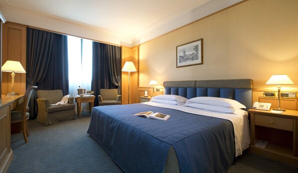 Down duvets, minibar, in-room safe, desk