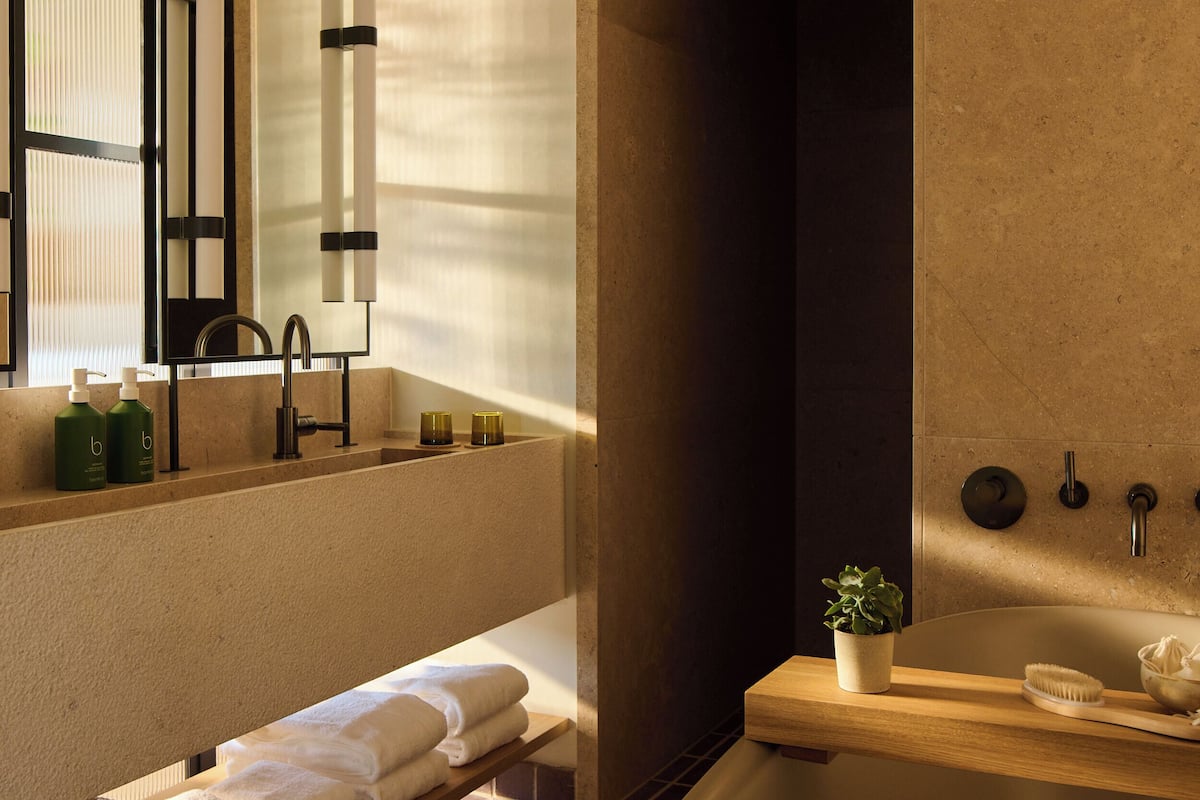 eco-friendly toiletries, hair dryer, bathrobes, slippers