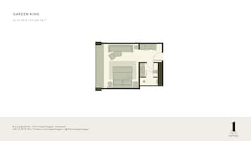 Plano de una habitación de hotel con cama, una zona de estar pequeña, baño y kitchenette.