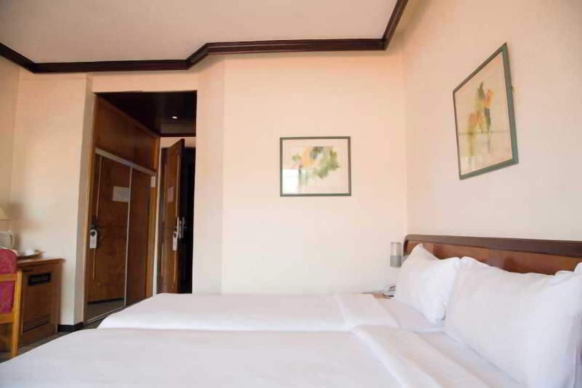 Egyptian cotton sheets, premium bedding, down duvets, minibar
