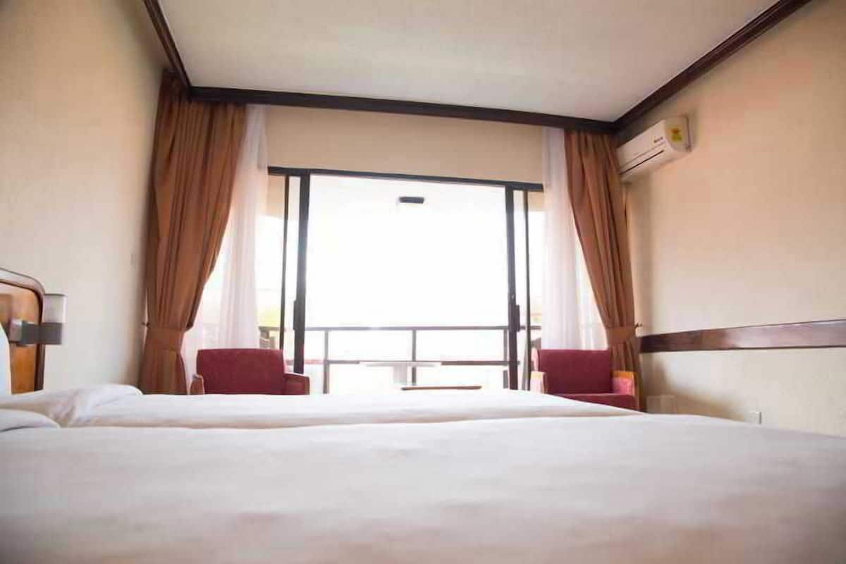 Egyptian cotton sheets, premium bedding, down duvets, minibar