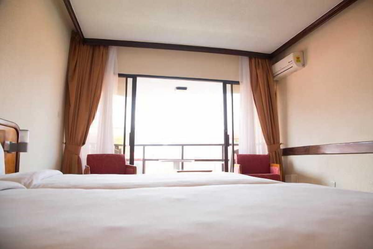 Egyptian cotton sheets, premium bedding, down duvets, minibar