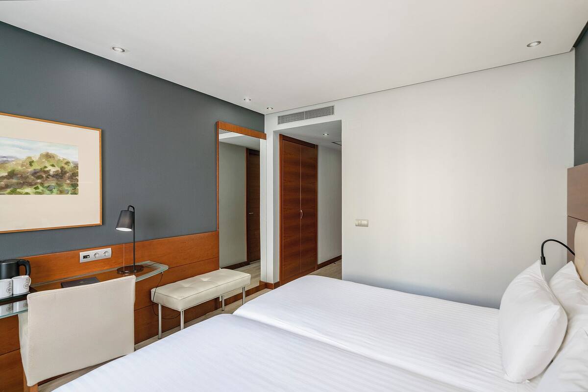 Down duvets, minibar, in-room safe, desk